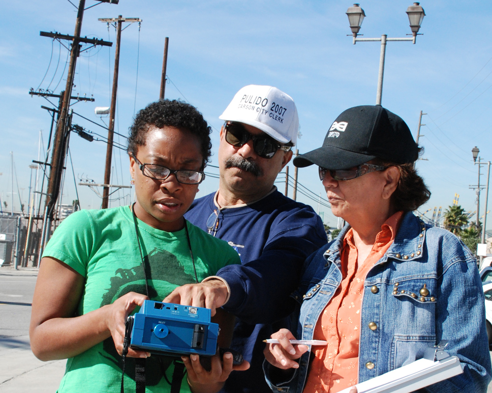 Residents use a device called a “Dust Trak” to check the air quality in Wilmington, Calif., near Los Angeles. The Liberty Hill Foundation’s Common Agenda program is mobilizing grass-roots organizations to clean up and green up low-income and minority communities affected by emissions from nearby industries and transportation hubs.